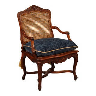 French Louis XV Style Carved Mahogany and Cane Armchair For Sale
