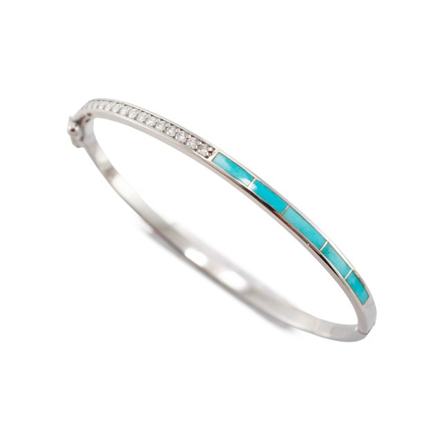 Gender: Ladies Metal Type: 14K White Gold Length: 7.00 inches Width: 3.30 mm Weight: 12.28 grams 14K white gold, diamond...