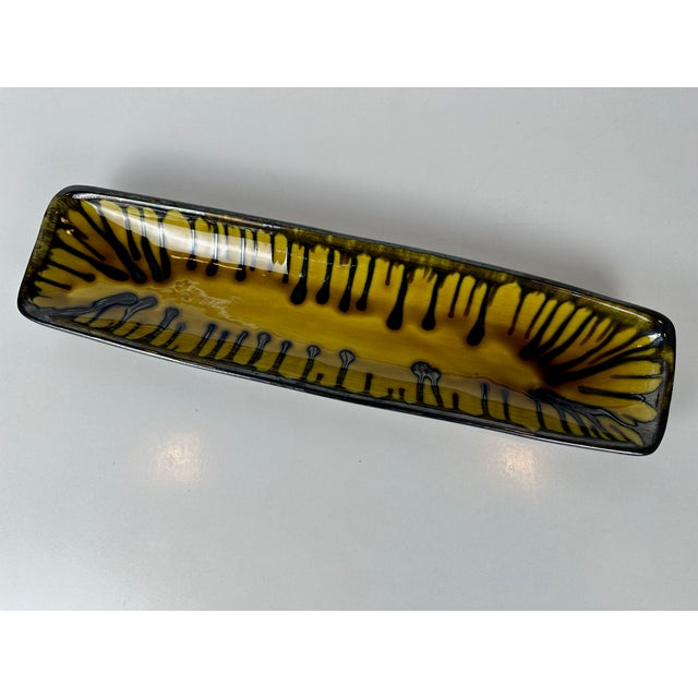 Vintage mid-century ceramic bowl. Made in Belgium in the 1960s. Beautiful mustard yellow color. In very good condition....