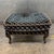 Design Plus Gallery presents a Traditional Geometric Velvet Ottoman. This upholstered footstool showcases a black velvet...