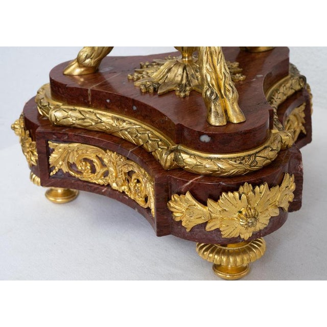 Pair of antique Napoleon III candelabra/flambeaux in gilded bronze and red Griotte marble dating from the second half of...