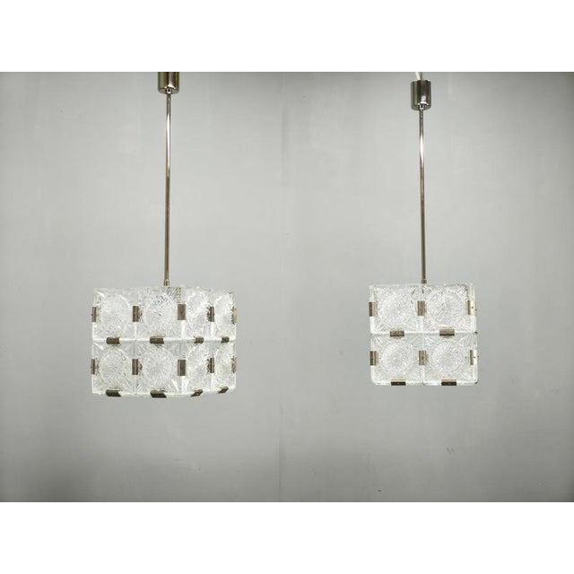 Exceptional pair of czechoslovak crystal glass cube pendant lights manufactured by lustry n. P., kamenický šenov in the...