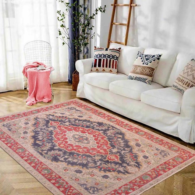 Enhance your living space with this stunning vintage Persian hand-knotted wool rug, a true showstopper that effortlessly...