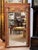 Early 19th C Continental Neoclassical mirror, the red painted frame with parcel-gilt ornament, the frieze applied with a...
