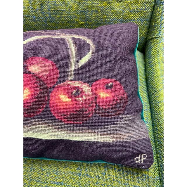 A cute throw pillow hand made using needlepoint. There is no date but it is signed dp. The back of the pillow is a pretty...