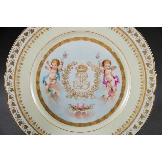 Six French Chateau Sevres Ivory Ground Decorated Plates With Chateau de Sevres Stampe on rear Dimensions: Diameter 8 7/8"...
