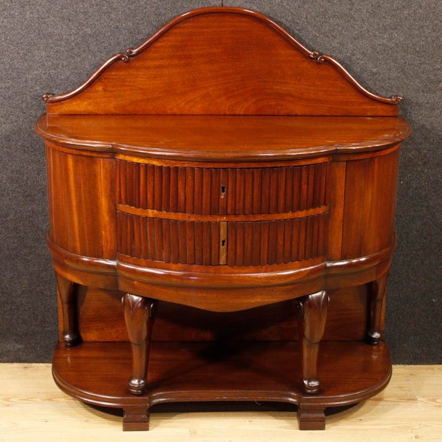 French chest of drawers from the first half of the 20th century. A high-quality carved mahogany commode. Two-drawer...