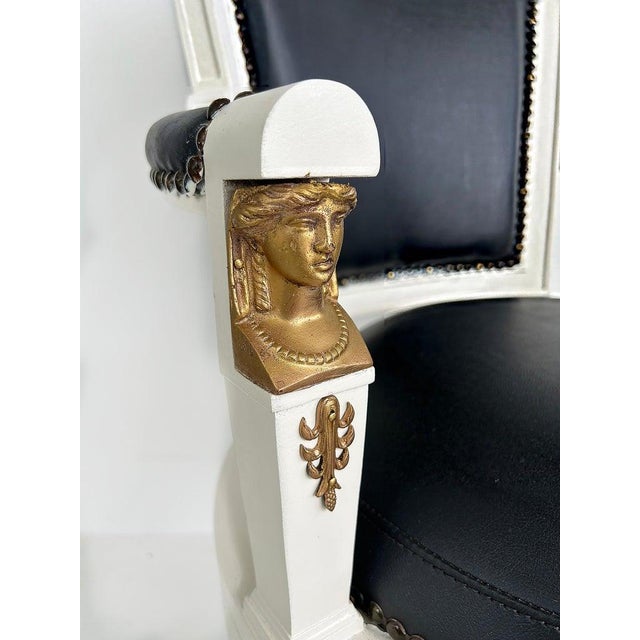 1850s French Empire Armchairs, Fine Gilt Bronze Mounts, Painted and Upholstered Offered for sale is an original pair of...