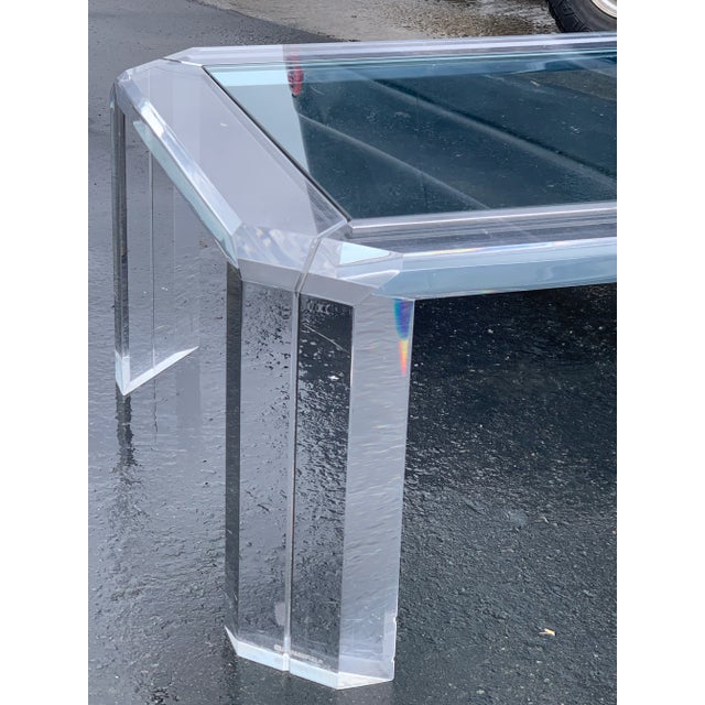Nice piece. Signed French possible. Mid century lucite coffee table.