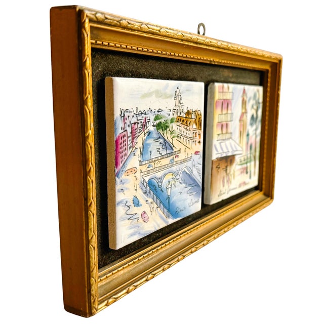Transport yourself to the heart of 1960s or 70s Paris with this vintage framed set of two hand-painted ceramic tiles...