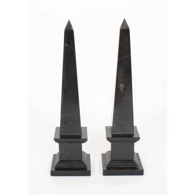 A stunning Vintage pair of large Empire Revival obelisks, dating from the late 20th Century. They are made of a dark...