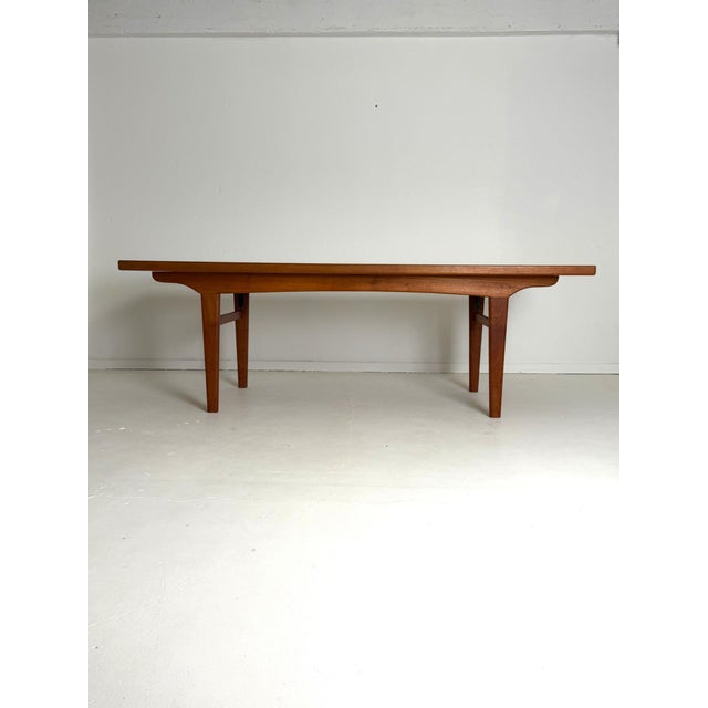 Large Teak Dining Table – Danish, 1960s A rare and generously sized Danish teak dining table from the 1960s. Its clean...