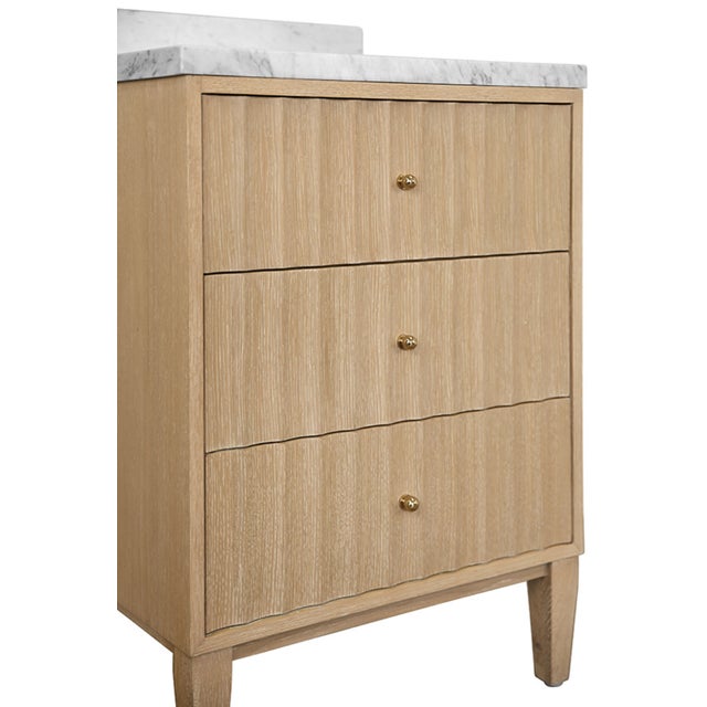 New special order item. Not vintage. Elevate your bathroom with the Odin 24" Fluted Cerused Oak Bath Vanity, a striking...