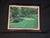 Framed landscape print of The White Dogwood Hole #11 at Augusta National, from The Augusta Collection by Nancy Ralston....
