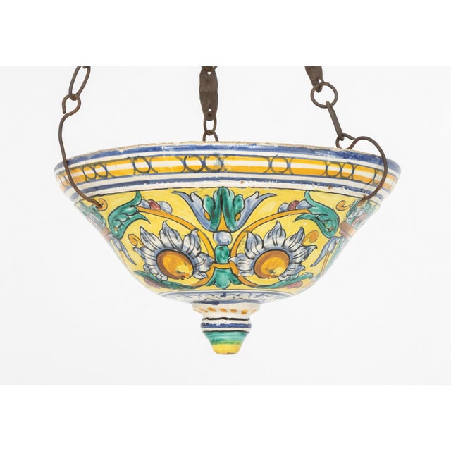 Italian Majolica Sunflower Motif Hanging Planter, polychrome glazed ceramic suspended from metal chain. 24" H x 12.25"...