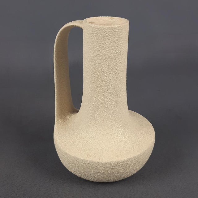 An interesting example of modernist ceramics from the 1960s and 1970s, a vase distinguished by its formal research and the...