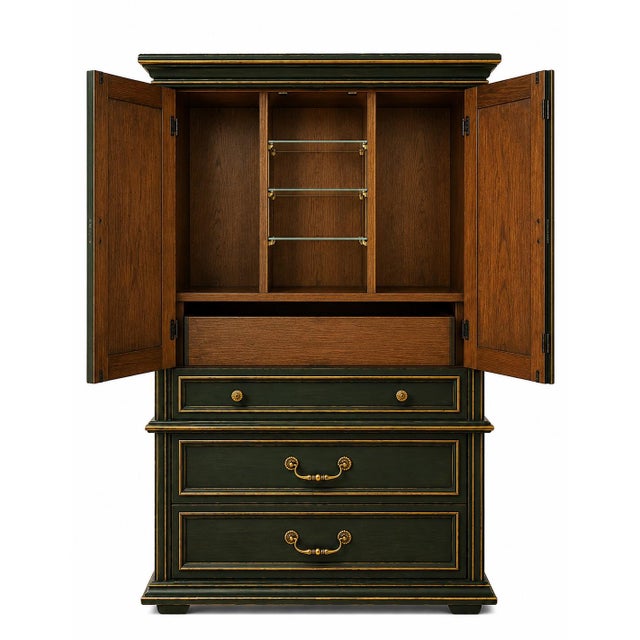 Vintage Mediterranean Revival gentleman’s cabinet refinished in our signature Onyx Emerald finish with hand-applied gold...