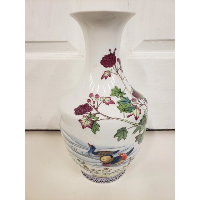 This is a Late 20th Century Chinese Porcelain Floral & Mandarin Duck Motif Vase, Stamped. It measures 12 3/4" high and 6...