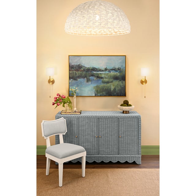 New special order item. Not vintage. Elevate your dining space with the Beatrice Light Blue Rattan Cabinet, a stunning...