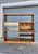 Mid 20th Century Two-Sided Bookcase Étagère and Room Divider With Glass Display Shelf For Sale - Image 4 of 12