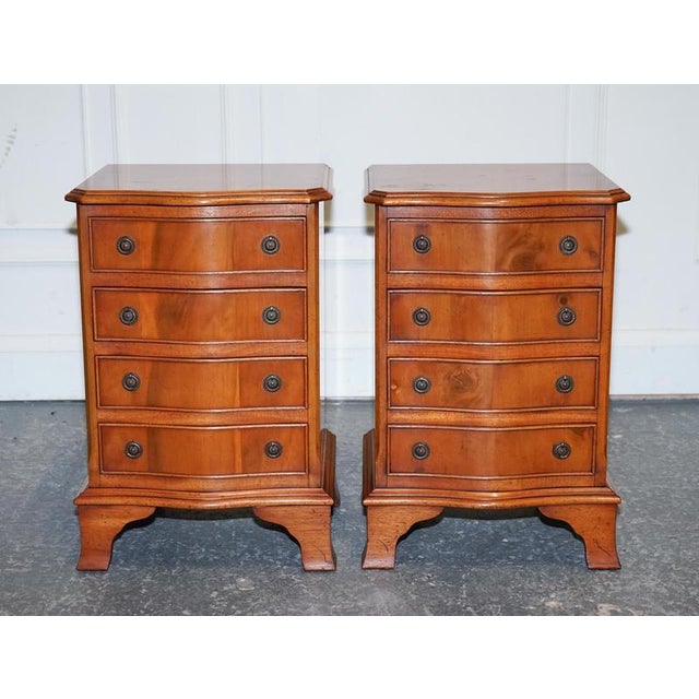 Antiques of London Elevate your bedroom décor with this stunning pair of vintage serpentine front bedside chests. These...