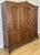This elegant Vintage French Louis wardrobe showcases timeless craftsmanship with beautifully grained wood, classic...