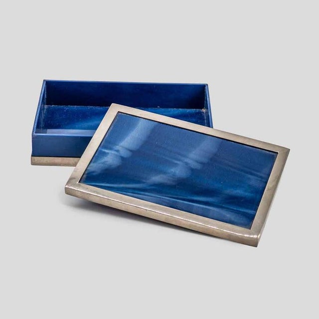 1980s Blue acrylic glass Box with Stainless Steel Accents A rrectangular box, dating from the 1980s, is crafted from...