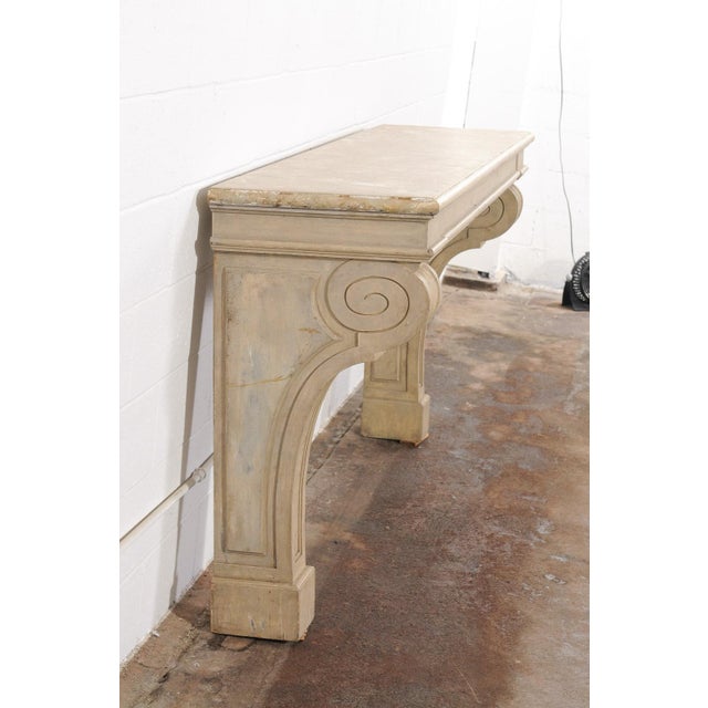 An impressive Italian wall-mounted console table from the early 20th century. This antique table from Italy has great...