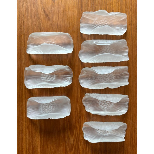 Set of vintage handcrafted frosted glass in the shape of a folded flower. 2 sets available (8 total napkin rings).