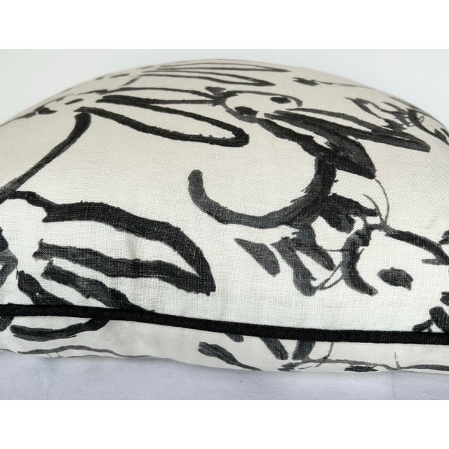 Artist Hunt Slonem's iconic "bunny hutch" pattern pillow cover with down filled insert included. The abstract black...