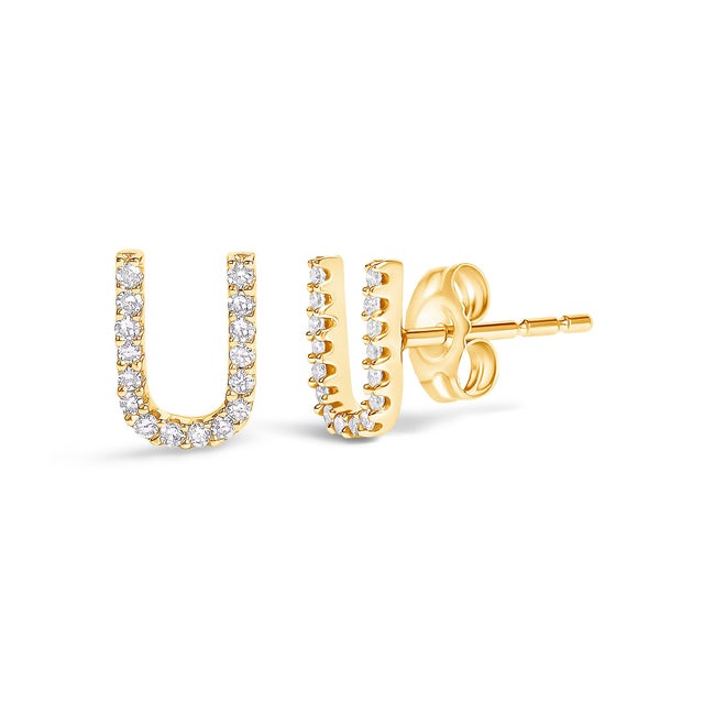 Expertly crafted to symbolize individuality and grace, this exquisite "U" initial stud earring is fashioned from radiant...