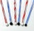 A whimsical set of six 1990s hand-blown glass cocktail swizzle sticks, each topped with a colorful lampworked rooster or...