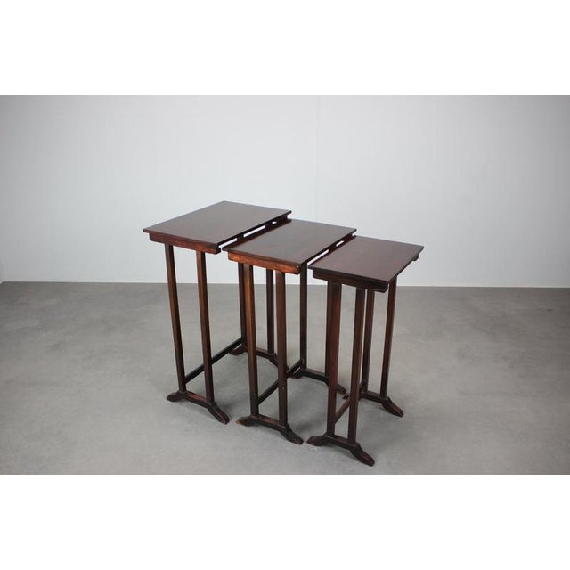 Elegant set of Art Deco nesting tables manufactured in Czechoslovakia during the 1930s. The tables showcase refined...