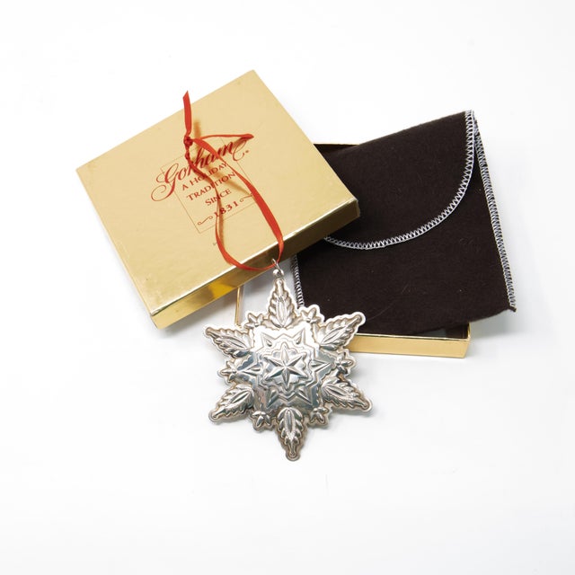 Offering a beautiful Gorham Sterling snowflake from 1999. Starting in the center with a 6 point star goes outward with...