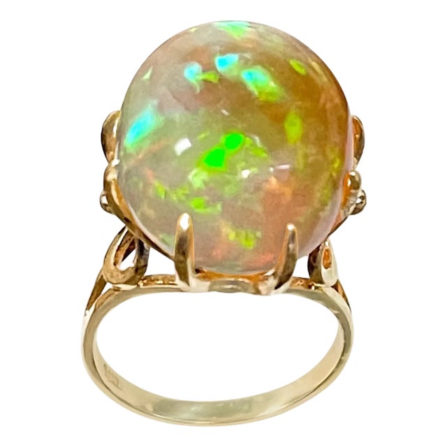 12 Carat Oval Shape Ethiopian Opal Cocktail Ring 14 Karat Yellow Gold For Sale