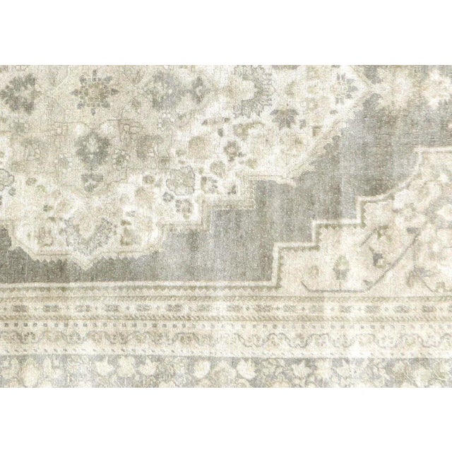 1950s Turkish Oushak Rug. Handwoven with wool on wool foundation in the Oushak region of Western Turkey. The Anatolian...