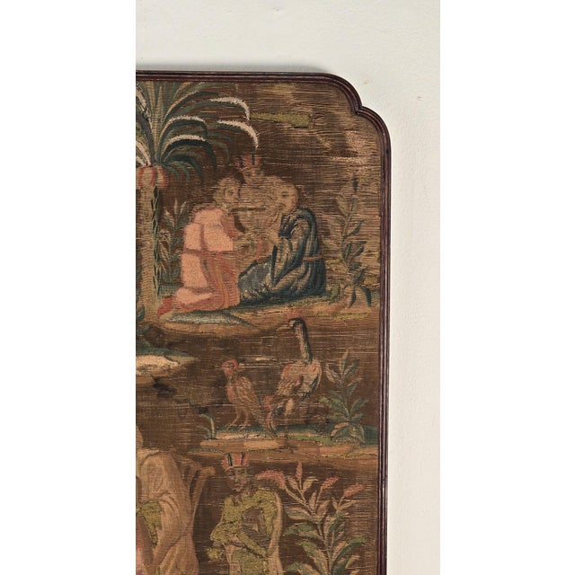 A Queen Anne Period chinoiserie tapestry in period walnut frame, England circa 1710.