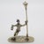 Curious vintage miniature depicting a drunk man leaning against a streetlamp, handcrafted in Italy between the 1980s and...