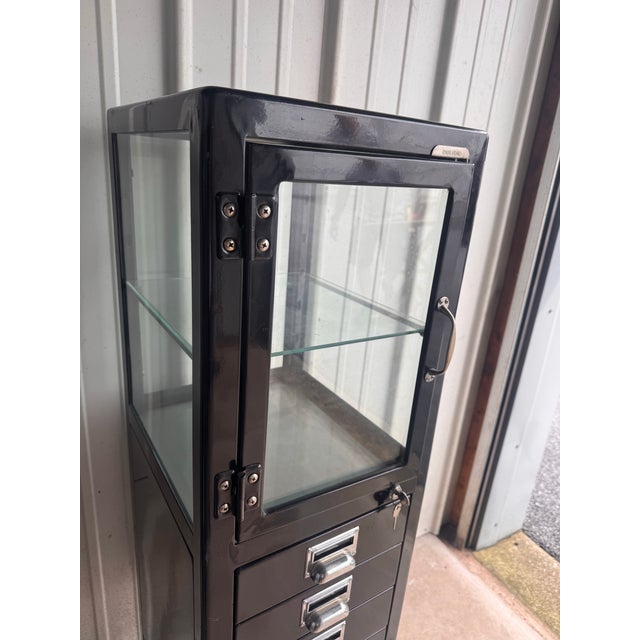 This pharmacy cabinet is manufactured by Dulton for Restoration Hardware’s retired industrial cabinet collection. This...