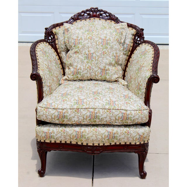 Bring timeless French elegance into your home with this exceptional antique Louis XV-style Bergère armchair, handcrafted...