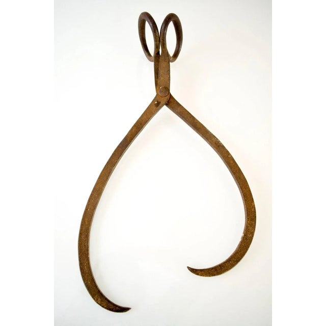 • Large antique ice block hook or hay bale carrier circa 1920-1930. • Beautiful wishbone shape with large oblong handles....