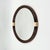 This elegant wall mirror was produced in France during the 1960s–1970s and reflects the refined use of molded plastic...