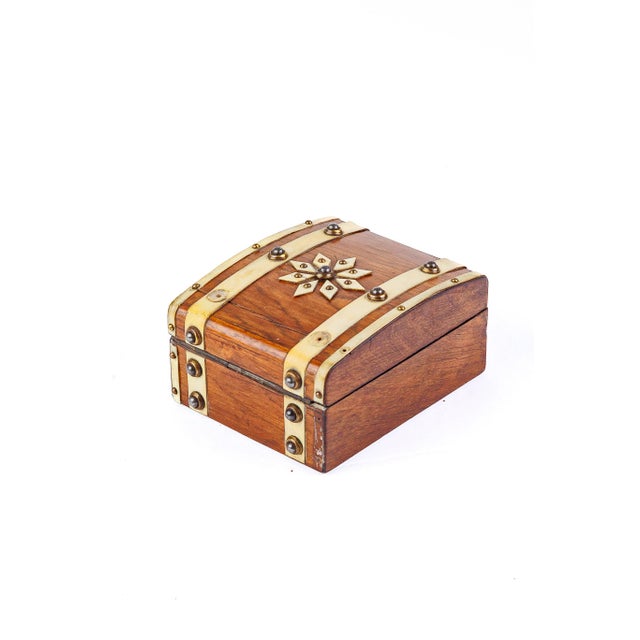 A charming English Victorian dome-lidded box in rich rosewood, banded in bone strapping with brass stud (pique) decoration...