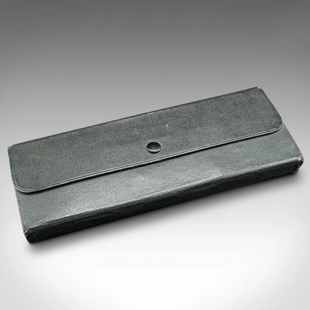 This is a vintage drawing instrument set. A German, nickel draughtsman's tool case by Schcenner, dating to the mid 20th...