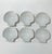 Set of six vintage white porcelain dishes shaped like scallop shells, with softly fluted detailing and a glossy finish....