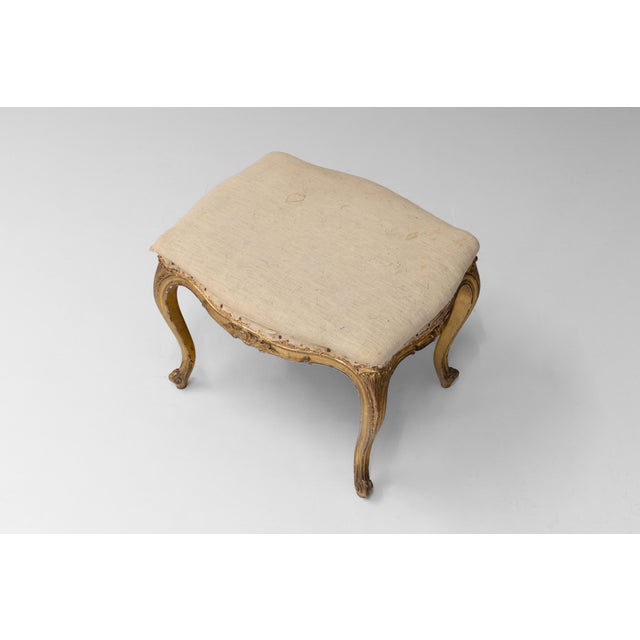 Cabriole leg French stool with original gilded finish. Circa 1880. Ready for a choice of upholstery.