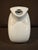 This collectible Fiesta pitcher in the classic periwinkle color holds 67 oz, adding supreme functionality to its art deco...