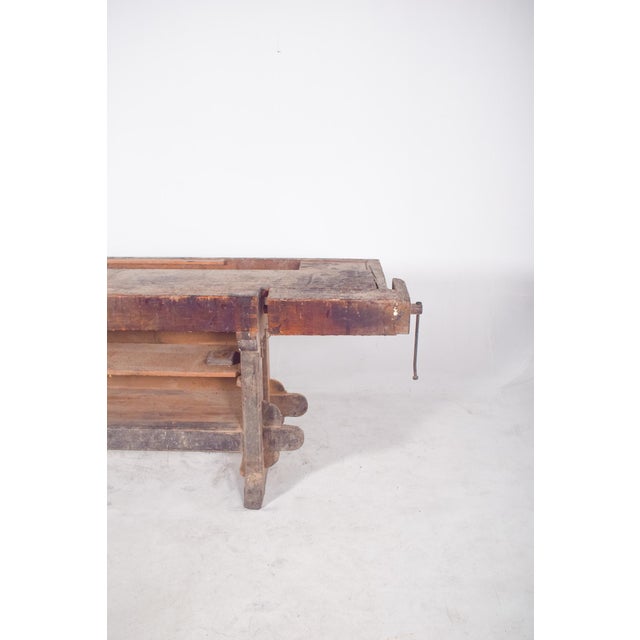 Cabinetmaker's work bench. This cabinetmaker's bench is a solid and austere piece, a silent testimony to long days of...