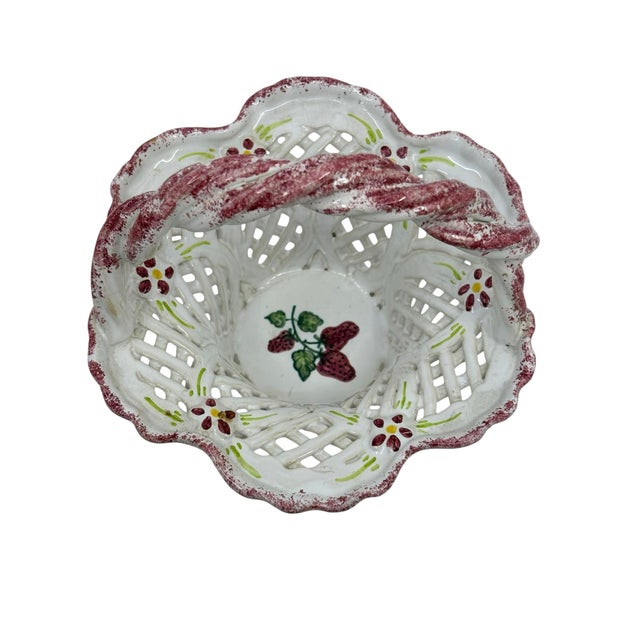 Vintage hand painted reticulated white and pink basket wirh handle. Hand painted raspberries in the center Signed and made...