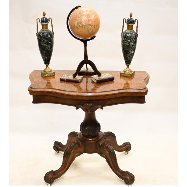 Quality Victorian card table in burr walnut We date this piece to circa 1880 Table opens out to reveal green beize lined...